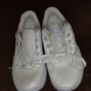 Comfortable white Nikes.